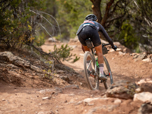 Heather Jackson riding Boken Doublecross on single track in Utah